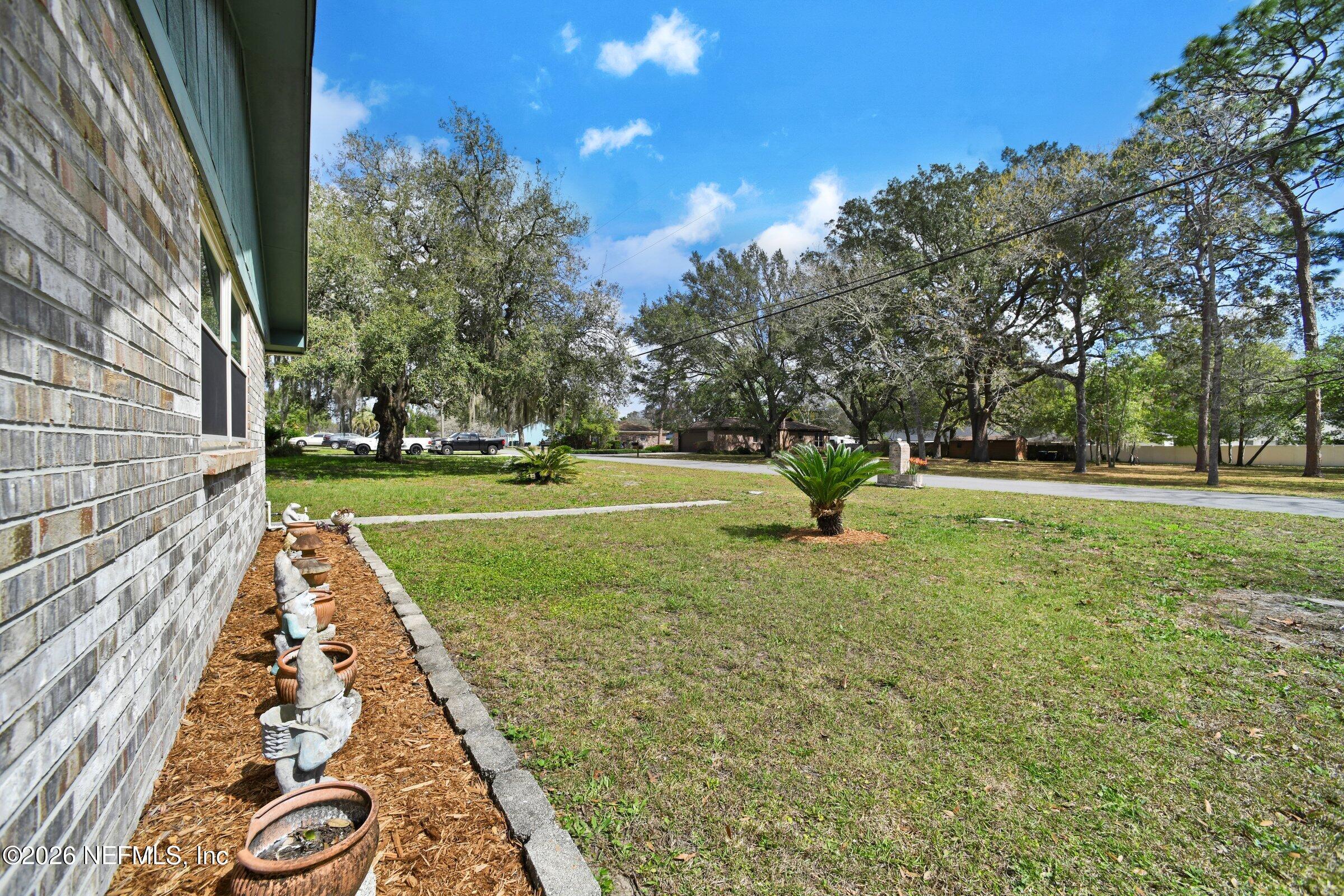 12790 Allport Road Jacksonville, FL 32258 - Photo 6 of 39 a view of outdoor space with garden
