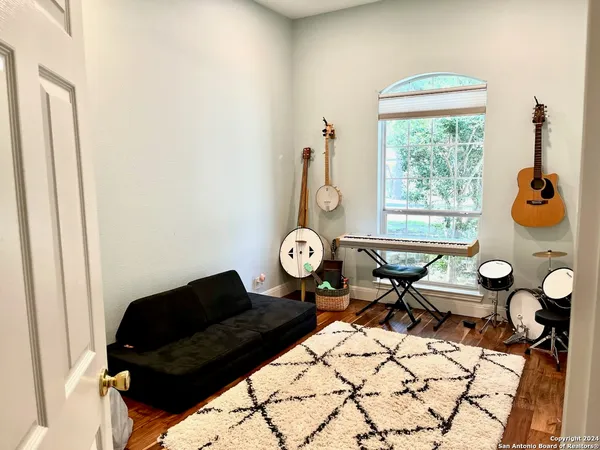 a living room with furniture and a window