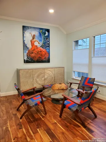 a living room with furniture and rug