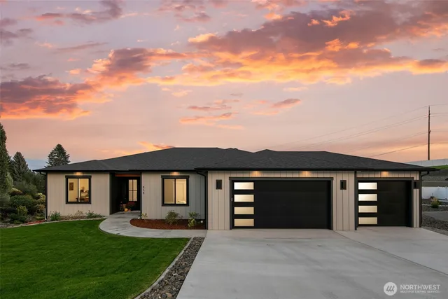 a front view of a house with yard outdoor seating and barbeque oven