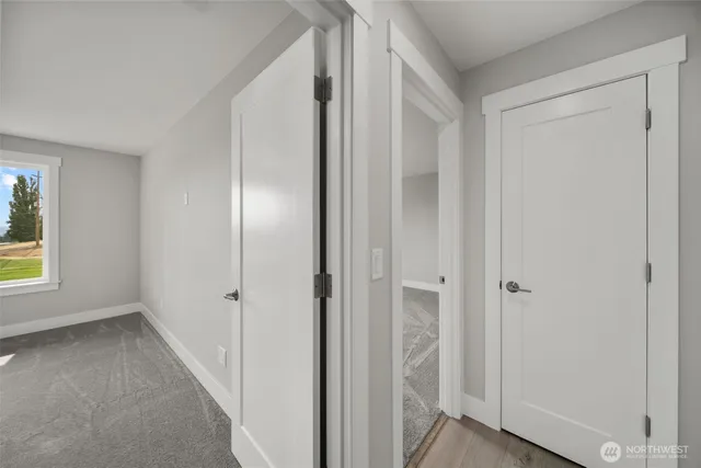 an aerial view of a house with a swimming pool