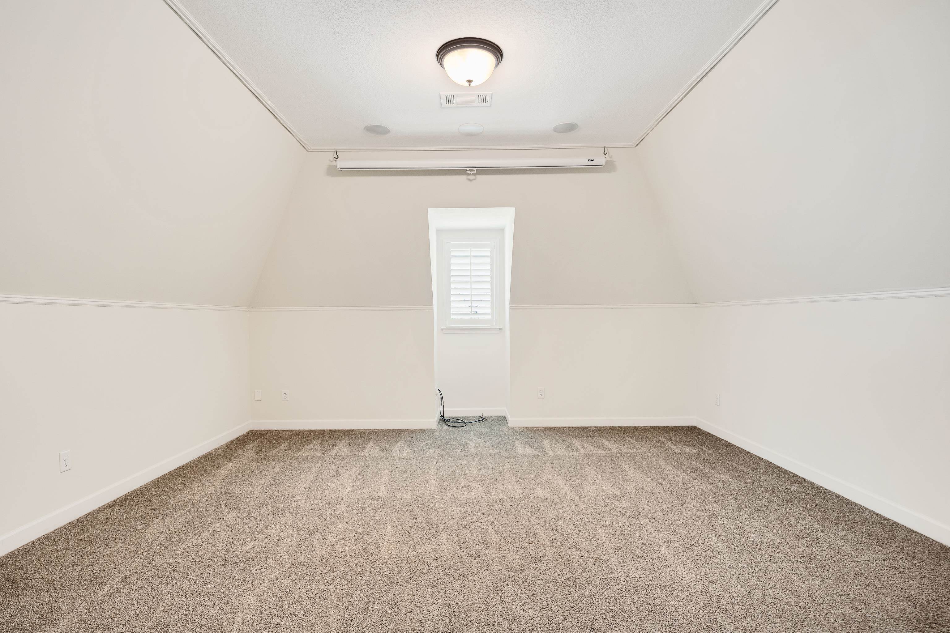 4728 Carousel Lane Collierville, TN 38017 - Photo 32 of 40 Bonus room featuring carpet floors, baseboards, and vaulted ceiling