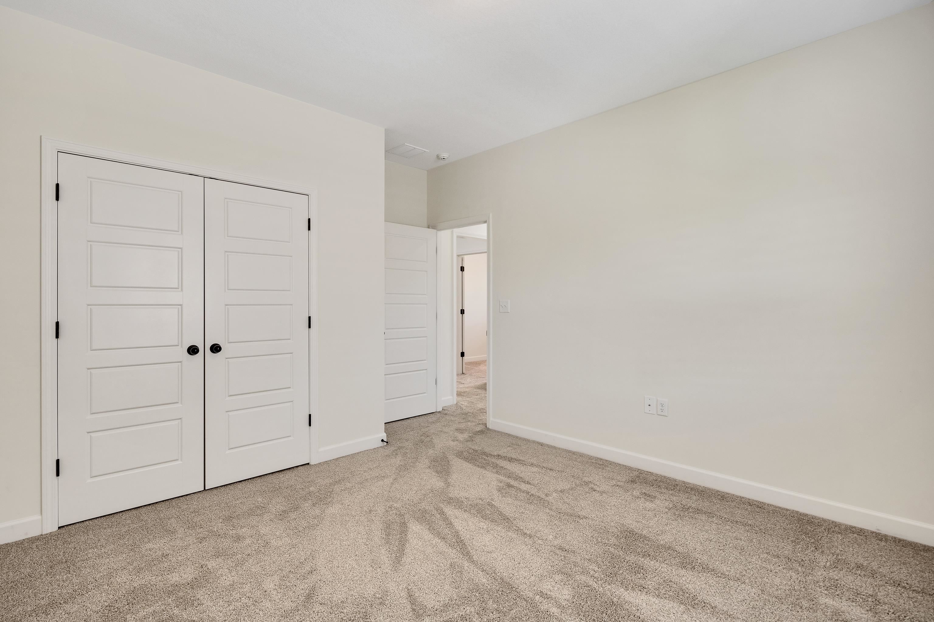 4728 Carousel Lane Collierville, TN 38017 - Photo 37 of 40 Unfurnished bedroom featuring carpet flooring, baseboards, and a closet