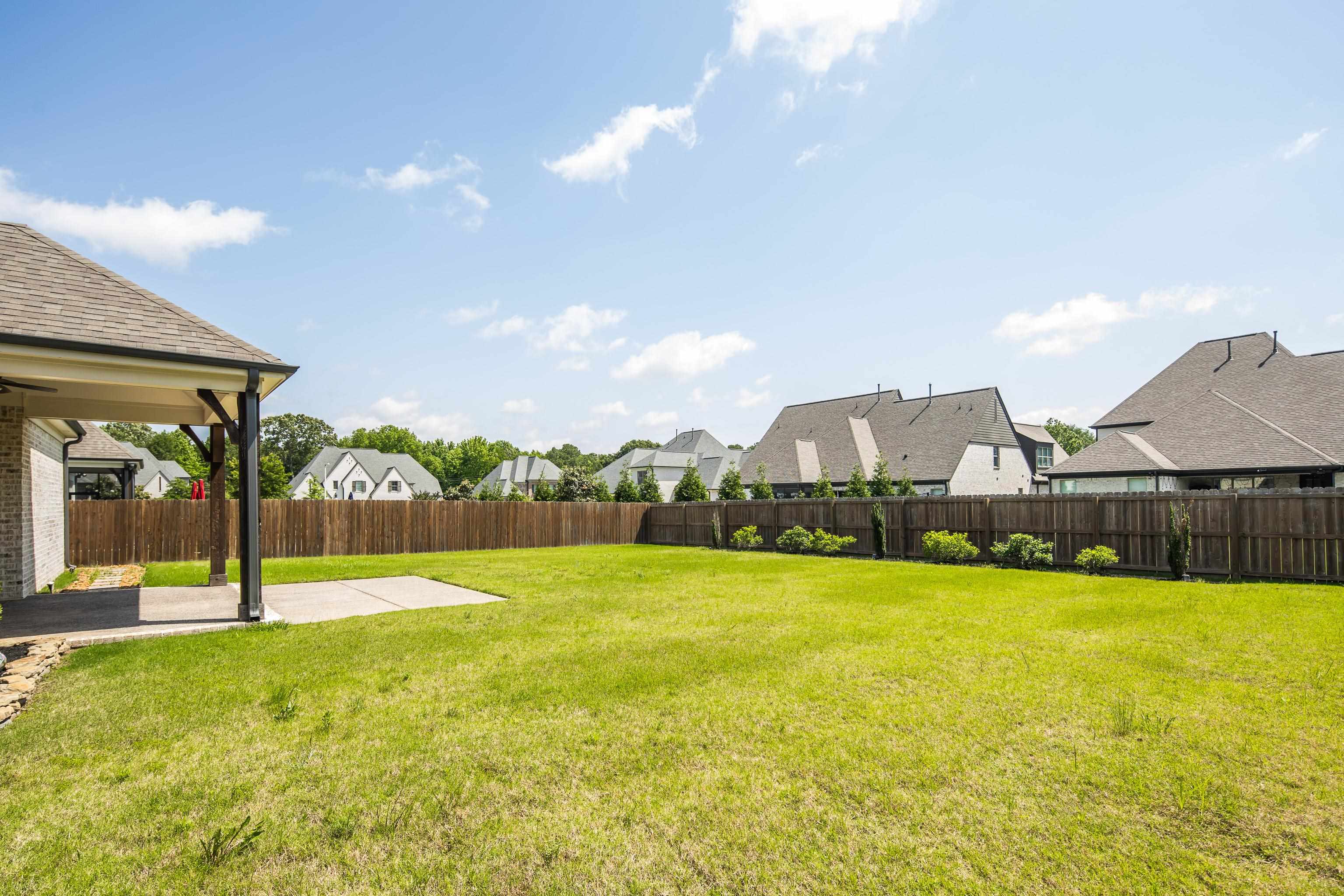 4728 Carousel Lane Collierville, TN 38017 - Photo 40 of 40 View of yard featuring a patio and a residential view