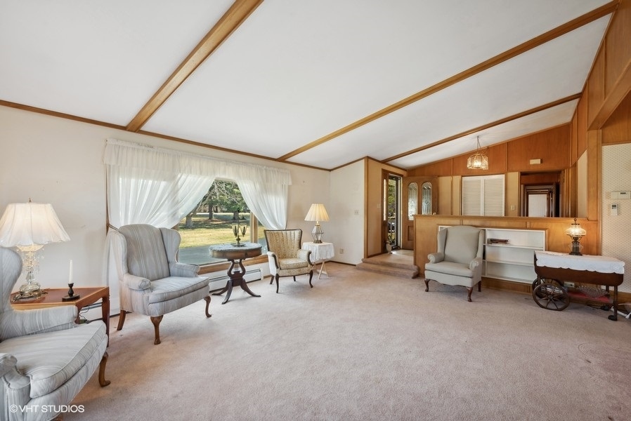 4605 South Ridgeway Road Ringwood, IL 60072 - Photo 3 of 25 a living room with furniture and a table