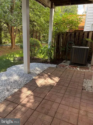 a view of a backyard with pathway