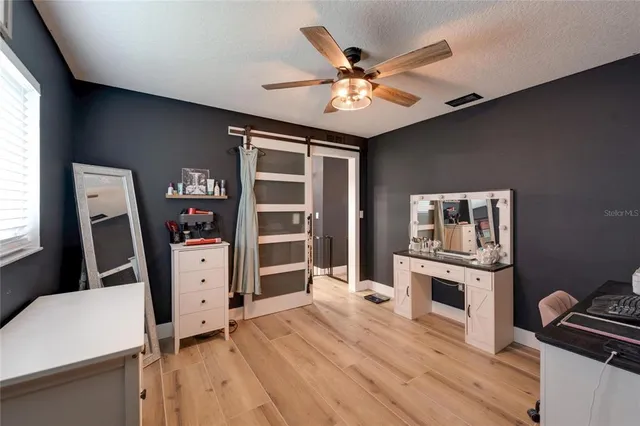 a outdoor space with patio furniture and a fireplace