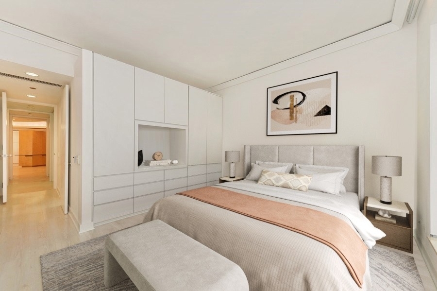 950 North Michigan Avenue, Unit 4003 Chicago, IL 60611 - Photo 12 of 28 a bedroom with a bed and a window