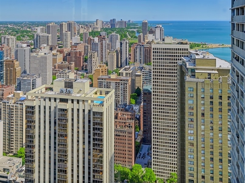 950 North Michigan Avenue, Unit 4003 Chicago, IL 60611 - Photo 18 of 28 a view of a city with tall buildings