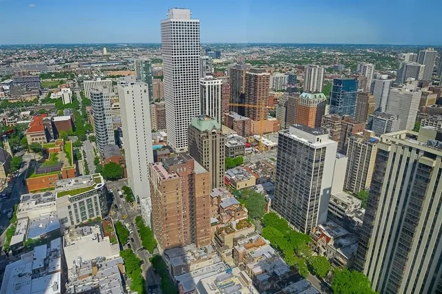 a view of a city with tall buildings