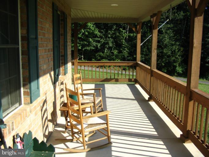 4441 Locust Grove Road Rohrersville, MD 21779 - Photo 1 of 23 a view of balcony with a potted plant