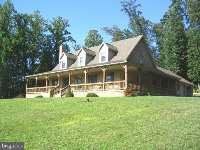4441 Locust Grove Road Rohrersville, MD 21779 - Photo 5 of 23 a view of a house with a yard and sitting area