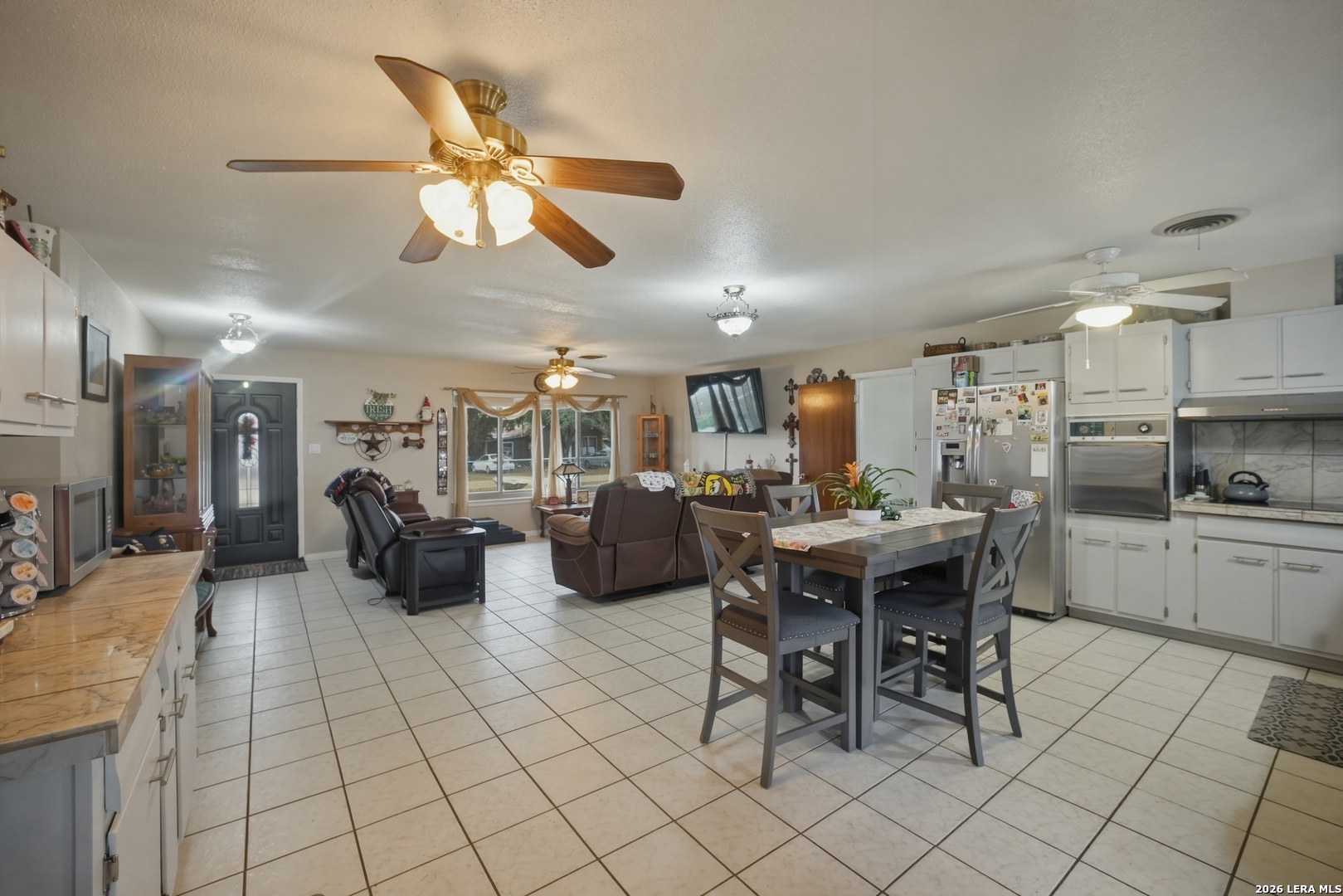 15047 Mesquite Street Lytle, TX 78052 - Photo 22 of 34 a view of a dining area with furniture