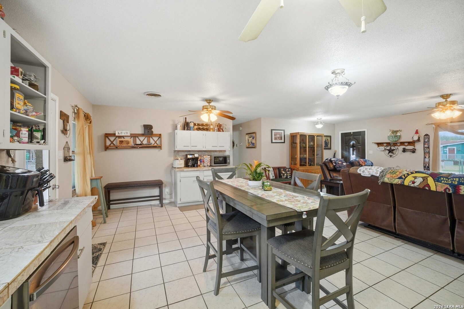 15047 Mesquite Street Lytle, TX 78052 - Photo 23 of 34 a view of a dining room with furniture