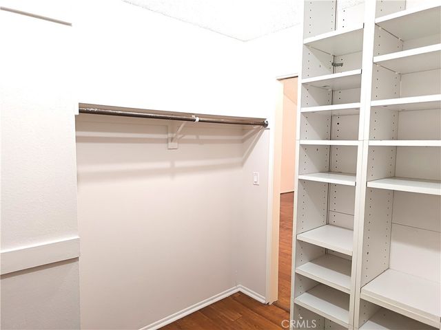 a view of an empty walk in closet