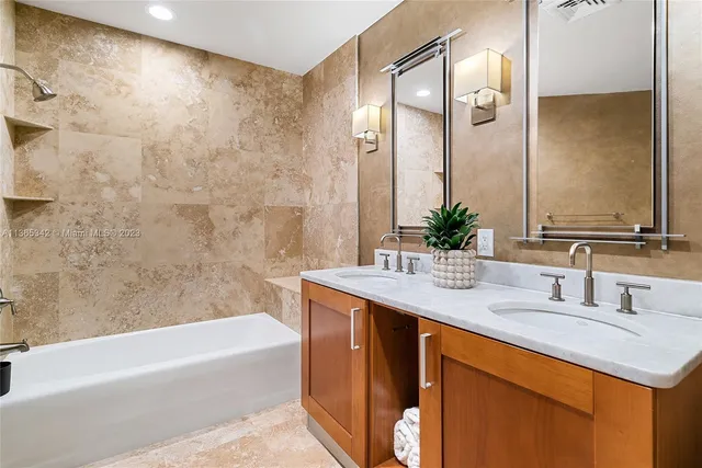 a view of a hallway with washer and dryer