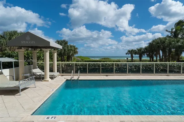 a view of a street with a tree
