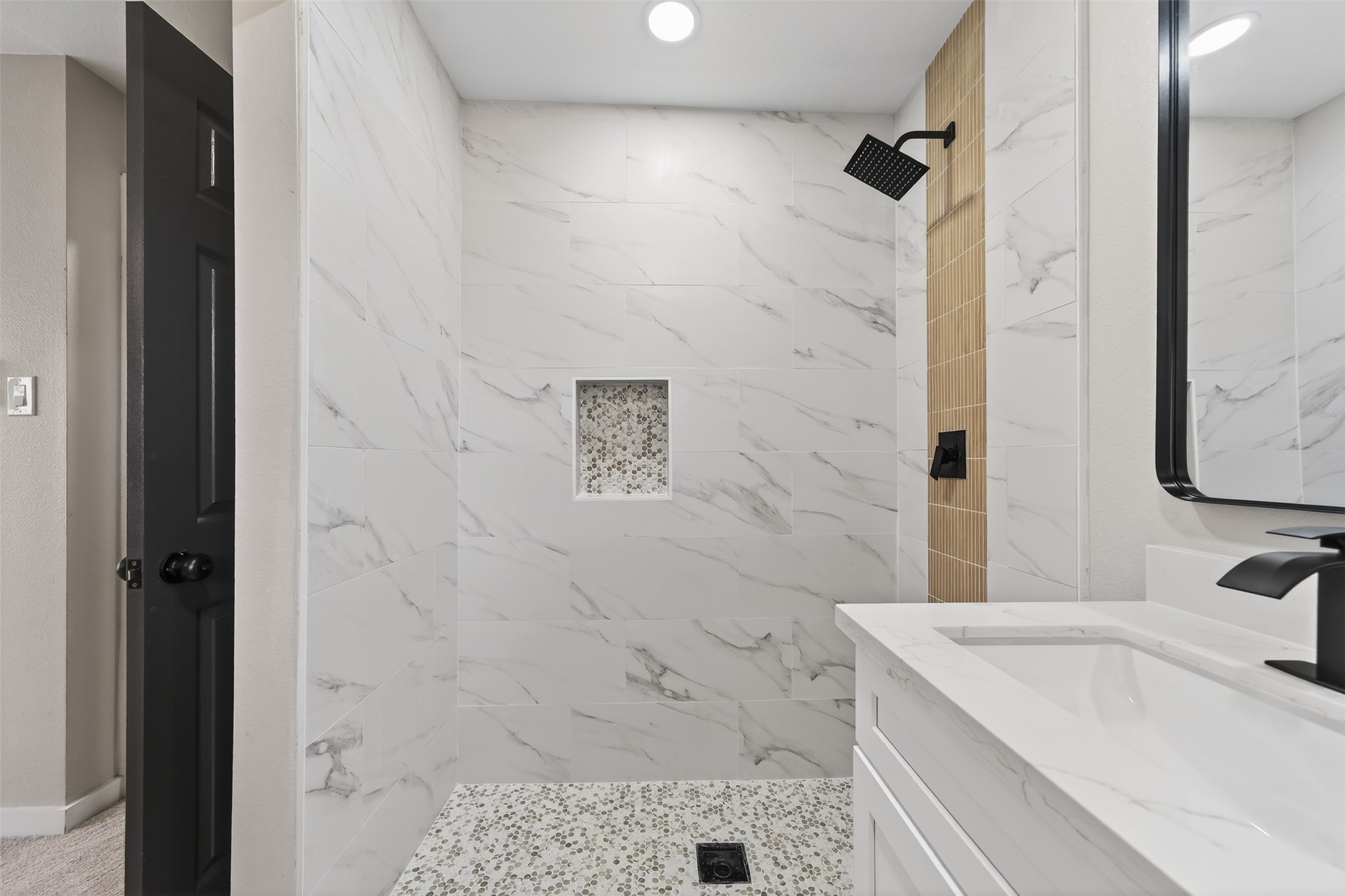 6026 Ridgeway Drive Houston, TX 77033 - Photo 22 of 27 a bathroom with a sink and a shower