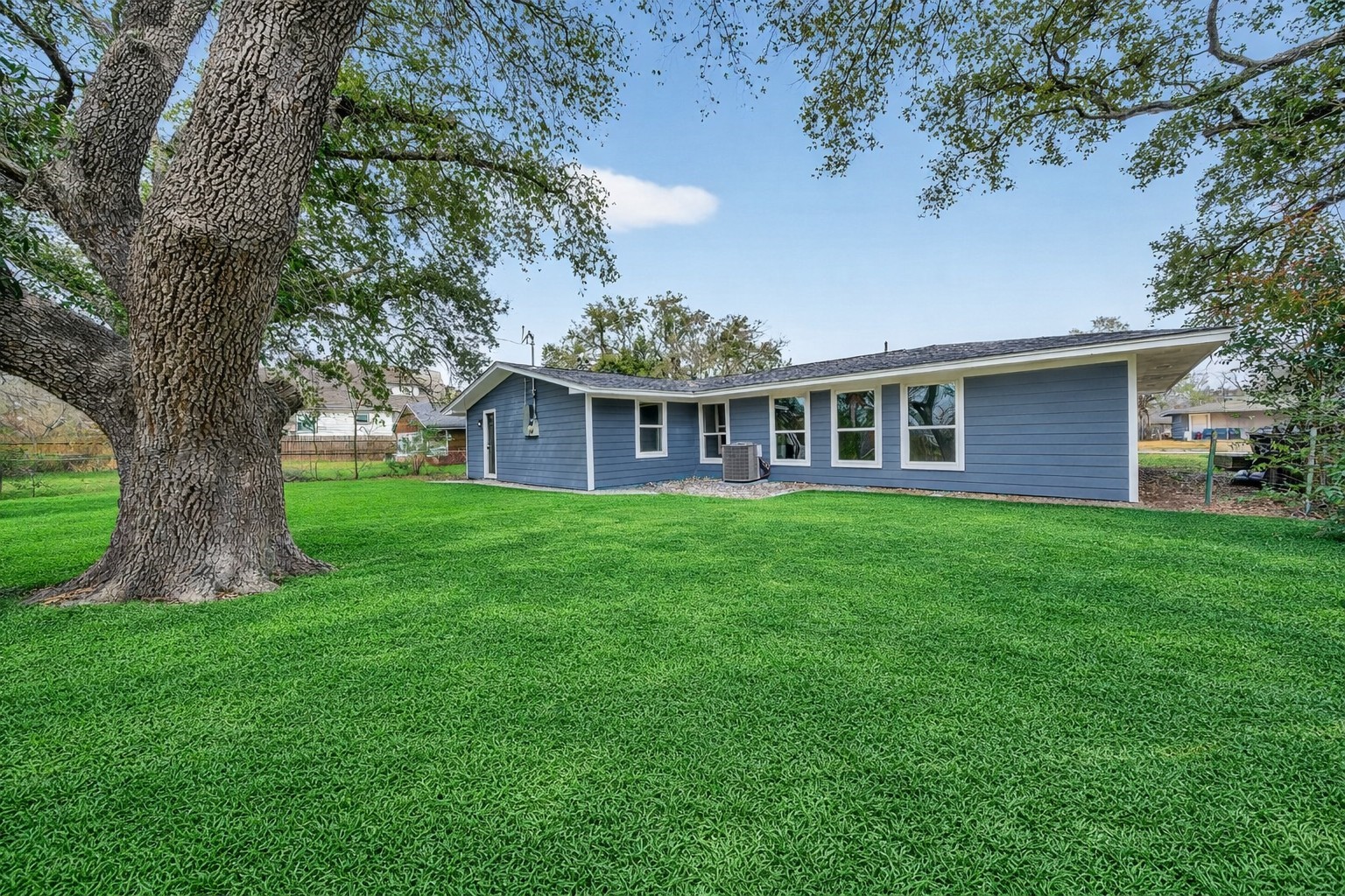 6026 Ridgeway Drive Houston, TX 77033 - Photo 26 of 27 a view of a house with a backyard
