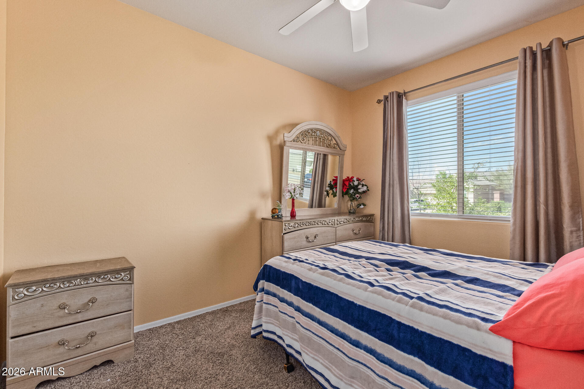 3847 North 308th Lane Buckeye, AZ 85396 - Photo 21 of 32 a living room with couch and a window
