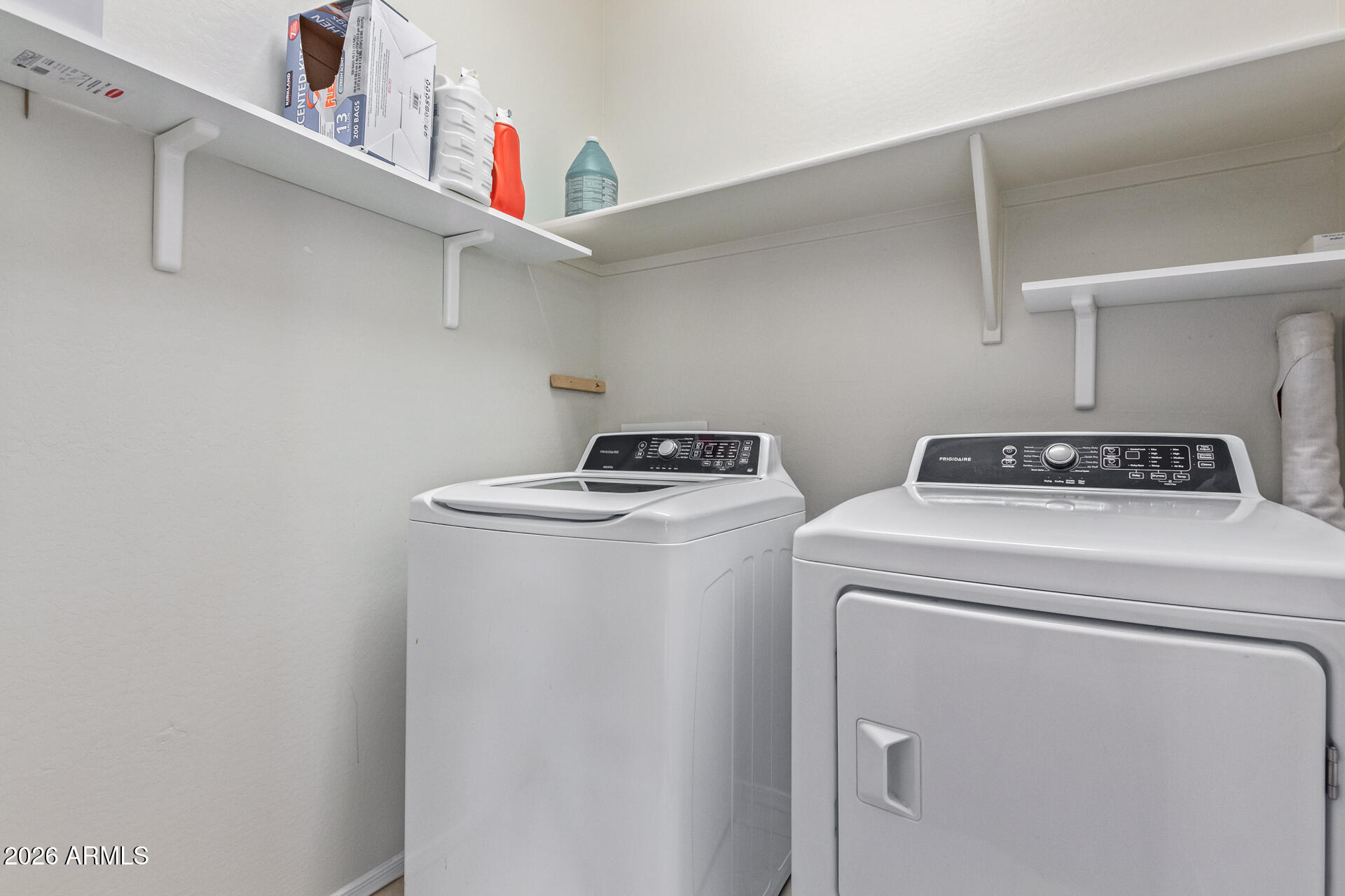 3847 North 308th Lane Buckeye, AZ 85396 - Photo 25 of 32 a utility room with dryer and washer