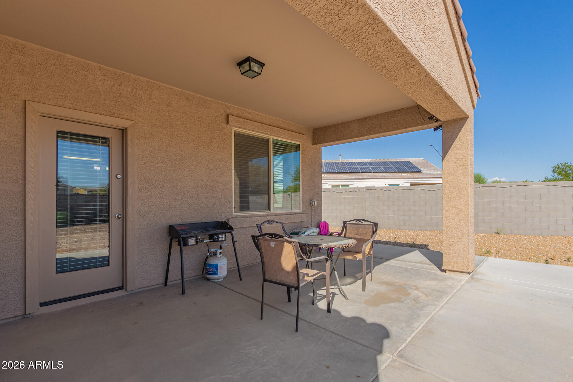 3847 North 308th Lane Buckeye, AZ 85396 - Photo 27 of 32 a workspace with furniture and window