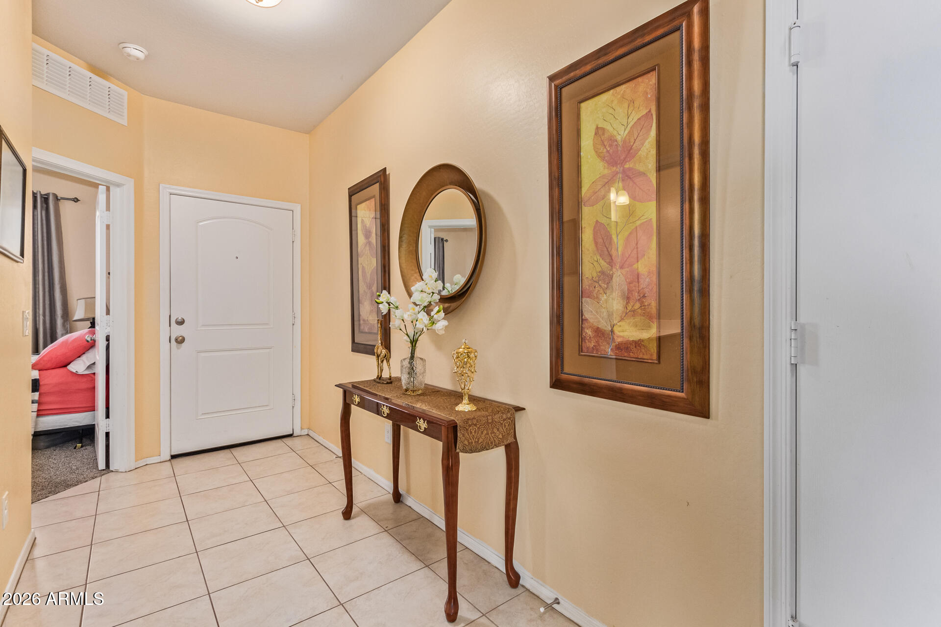 3847 North 308th Lane Buckeye, AZ 85396 - Photo 4 of 32 a view of a storage & utility room with furniture