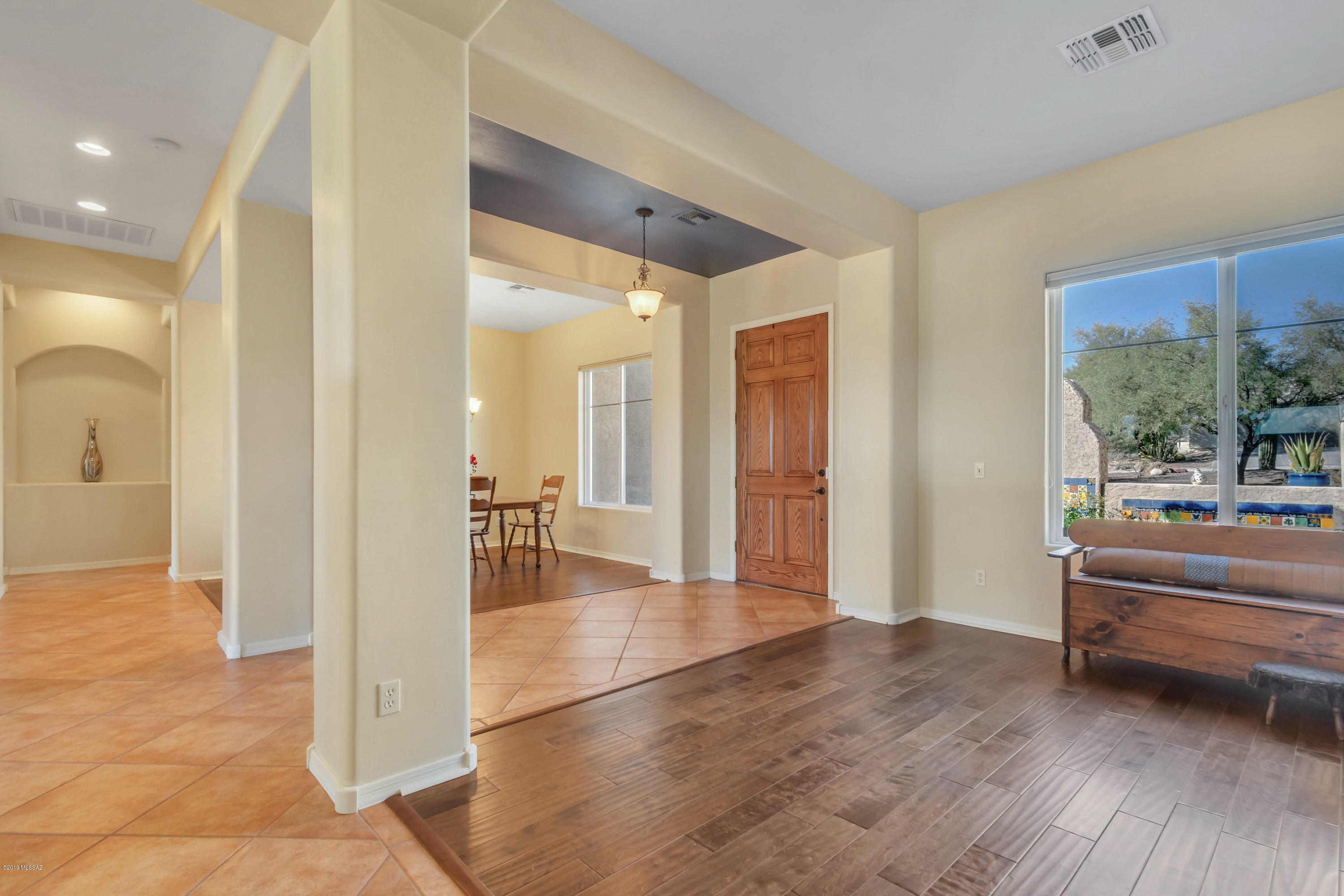 12682 North Spirit Mountain Road Oro Valley, AZ 85755 - Photo 28 of 40 a view of a room with a furniture and floor to ceiling window