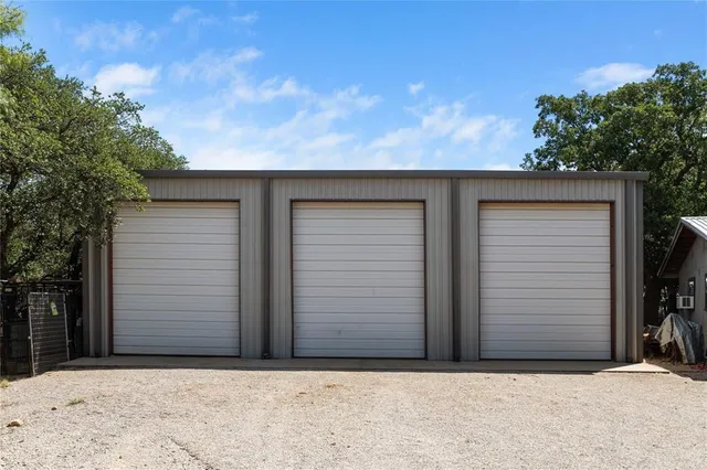 a big yard with flowing stream of water in middle
