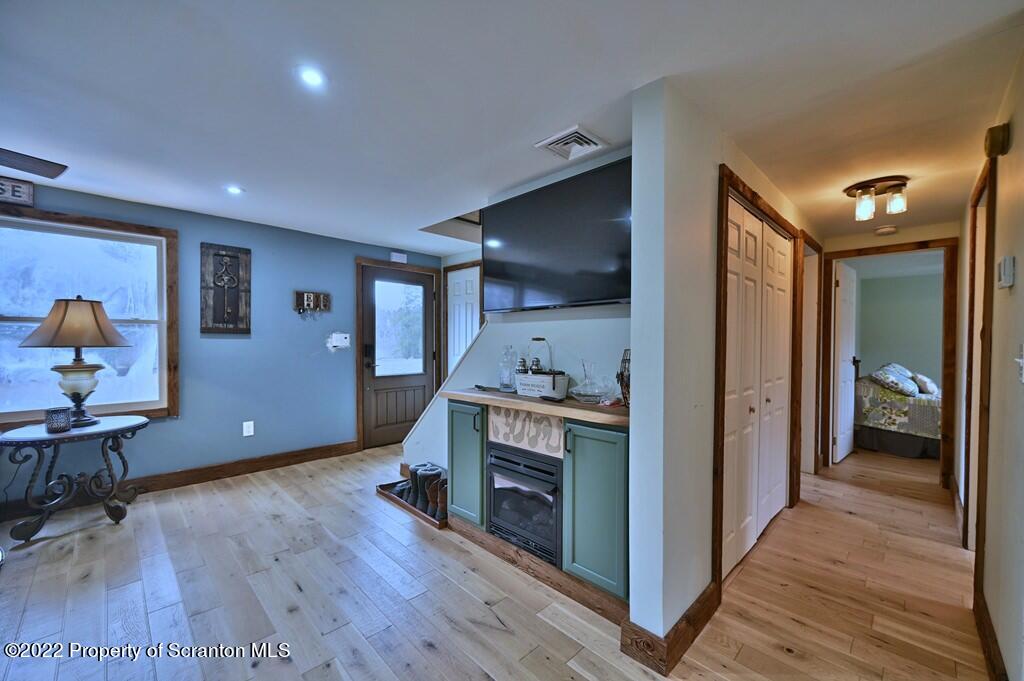 22 Suetta Lane Moscow, PA 18444 - Photo 13 of 53 a view of a livingroom with furniture and hardwood floor