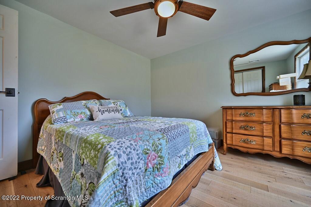 22 Suetta Lane Moscow, PA 18444 - Photo 24 of 53 a bedroom with a bed and a dresser