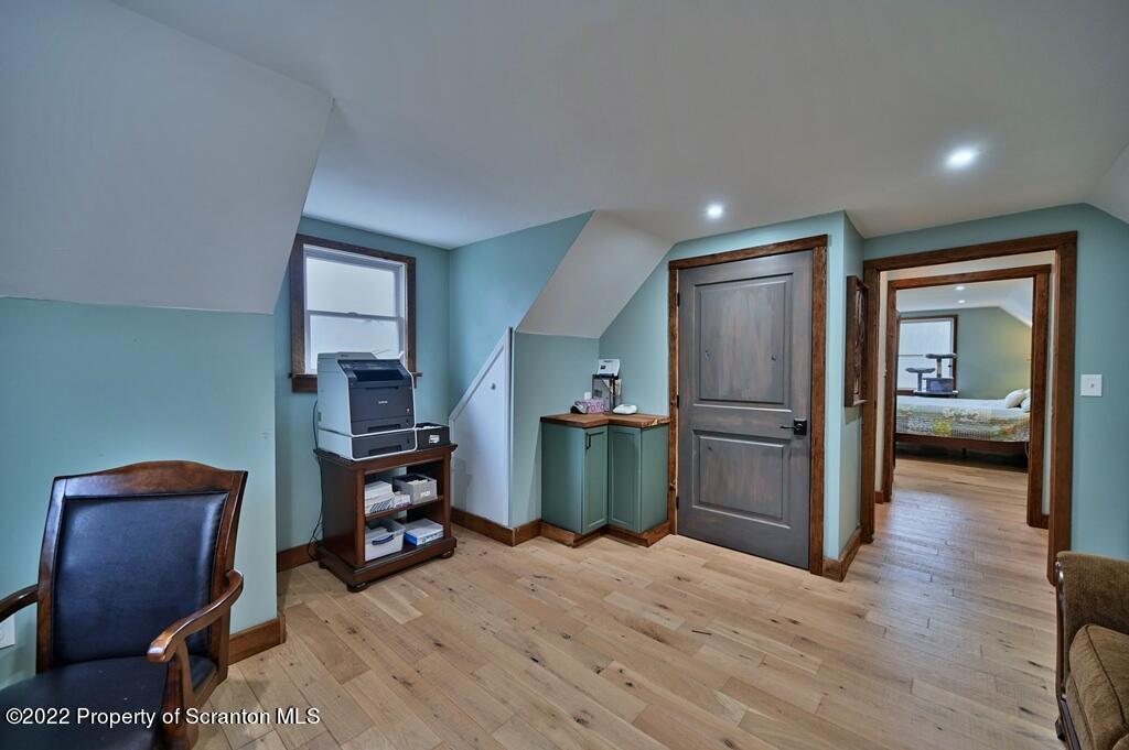 22 Suetta Lane Moscow, PA 18444 - Photo 29 of 53 a view of a workspace with furniture and a bedroom