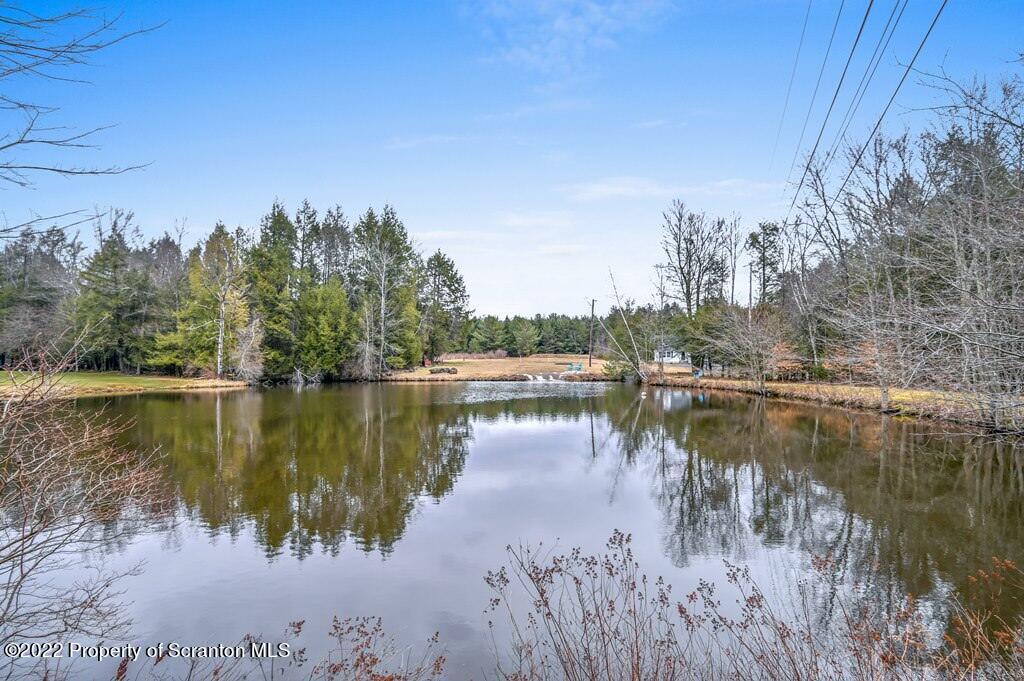 22 Suetta Lane Moscow, PA 18444 - Photo 46 of 53 a view of a lake with houses in the back