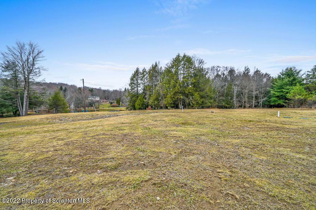 22 Suetta Lane Moscow, PA 18444 - Photo 49 of 53 a view of a field with trees in the background