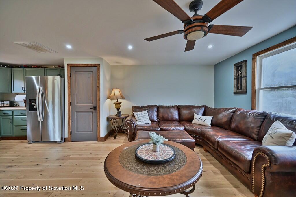 22 Suetta Lane Moscow, PA 18444 - Photo 4 of 53 a living room with furniture and a wooden floor