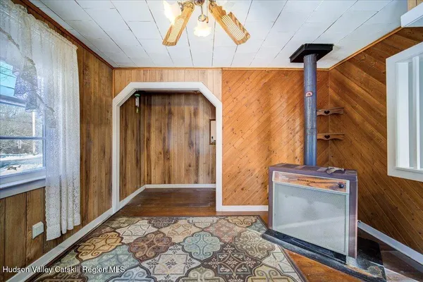 a view of an entryway with a fireplace