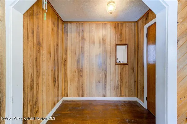 a view of a bathroom with shower and a window