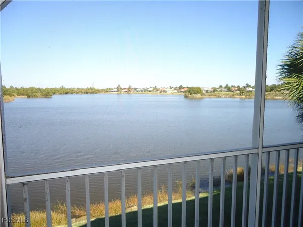 a view of a balcony next to a lake view