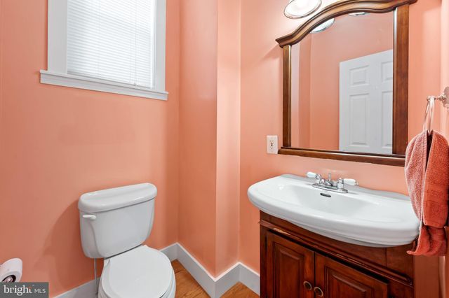 a kitchen with stainless steel appliances a stove microwave and refrigerator