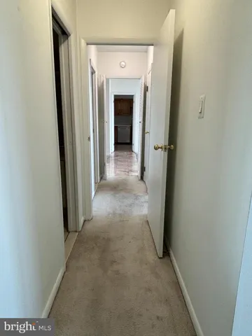 a view of a building with sitting area