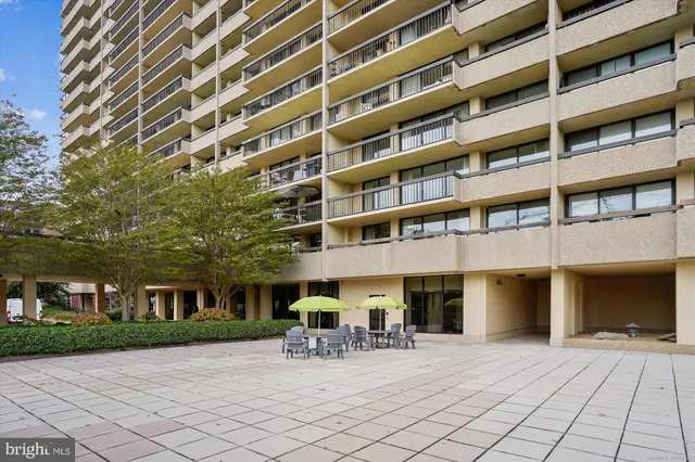 a view of an empty room with wooden door