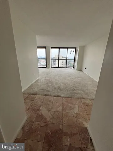 a big room with windows and closet