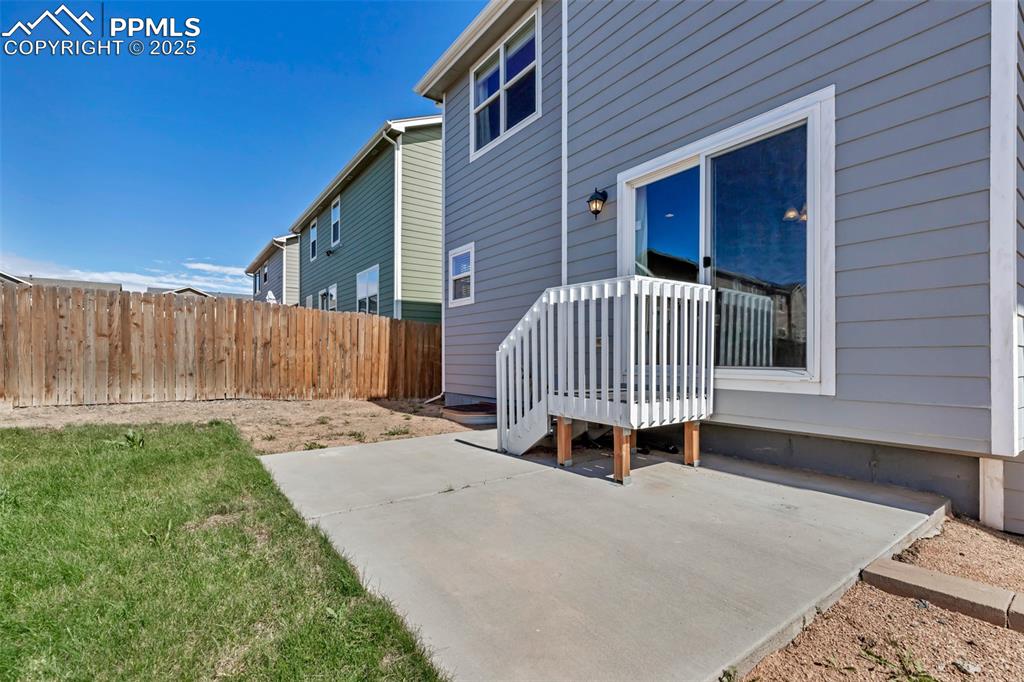 1822 Bulrush Way Colorado Springs, CO 80915 - Photo 37 of 37 a front view of a house with garden