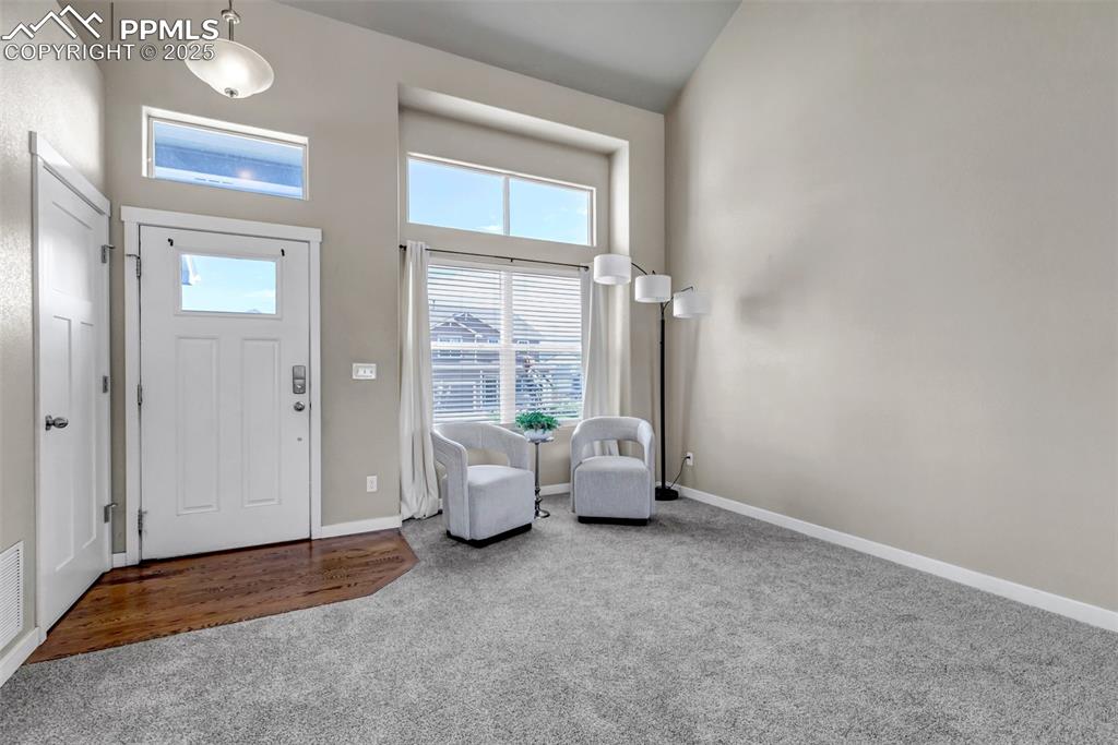 1822 Bulrush Way Colorado Springs, CO 80915 - Photo 4 of 37 a view of livingroom with furniture and window