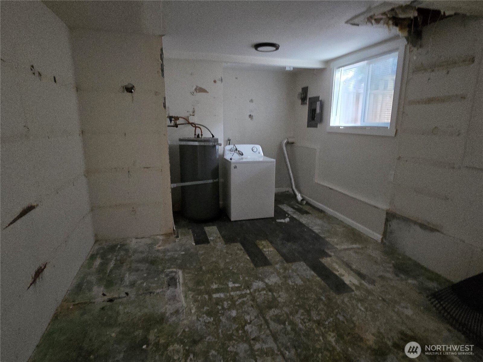 8405 24th Avenue Southwest Seattle, WA 98106 - Photo 10 of 14 a room with storage and utility