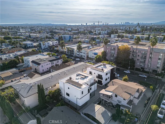 an aerial view of a city with lots of residential buildings