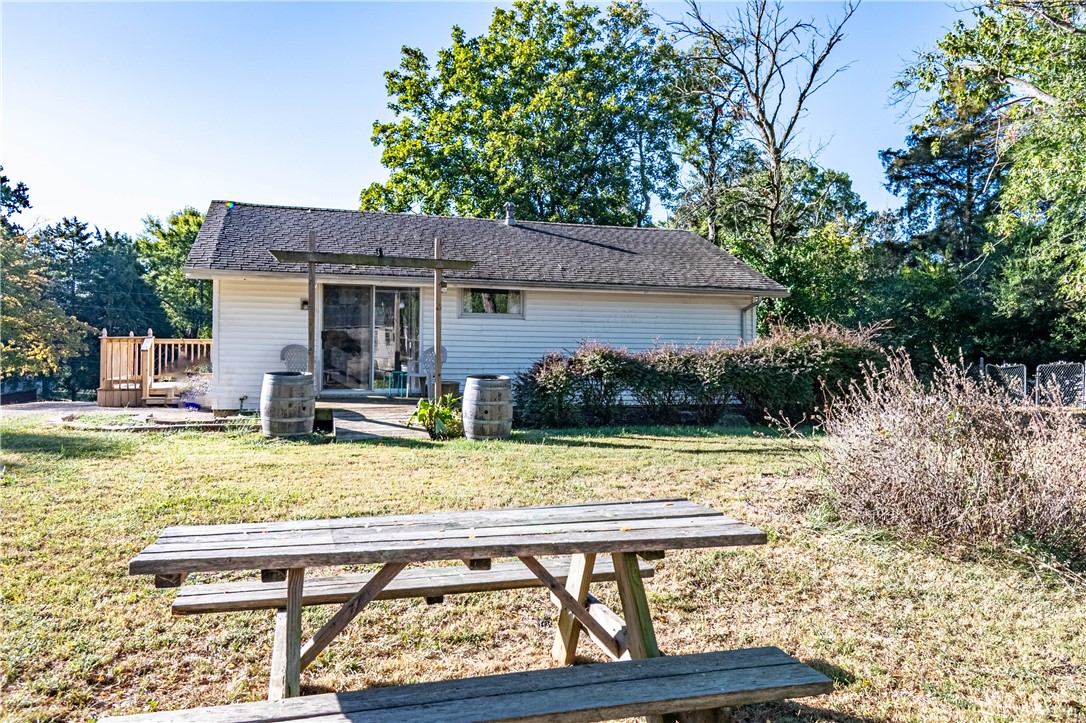 4016 Bayview Drive Decatur, IL 62521 - Photo 14 of 15 a view of a house with a yard and sitting area
