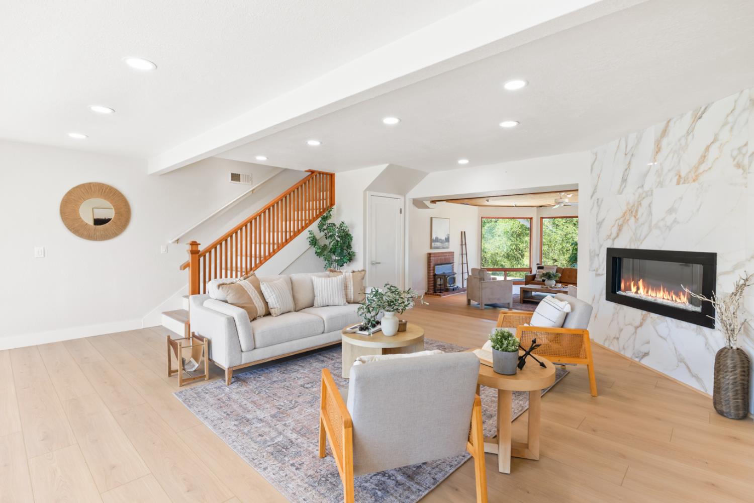 2495 Meadow Creek Road Lincoln, CA 95648 - Photo 16 of 94 a living room with furniture a fireplace and a large window