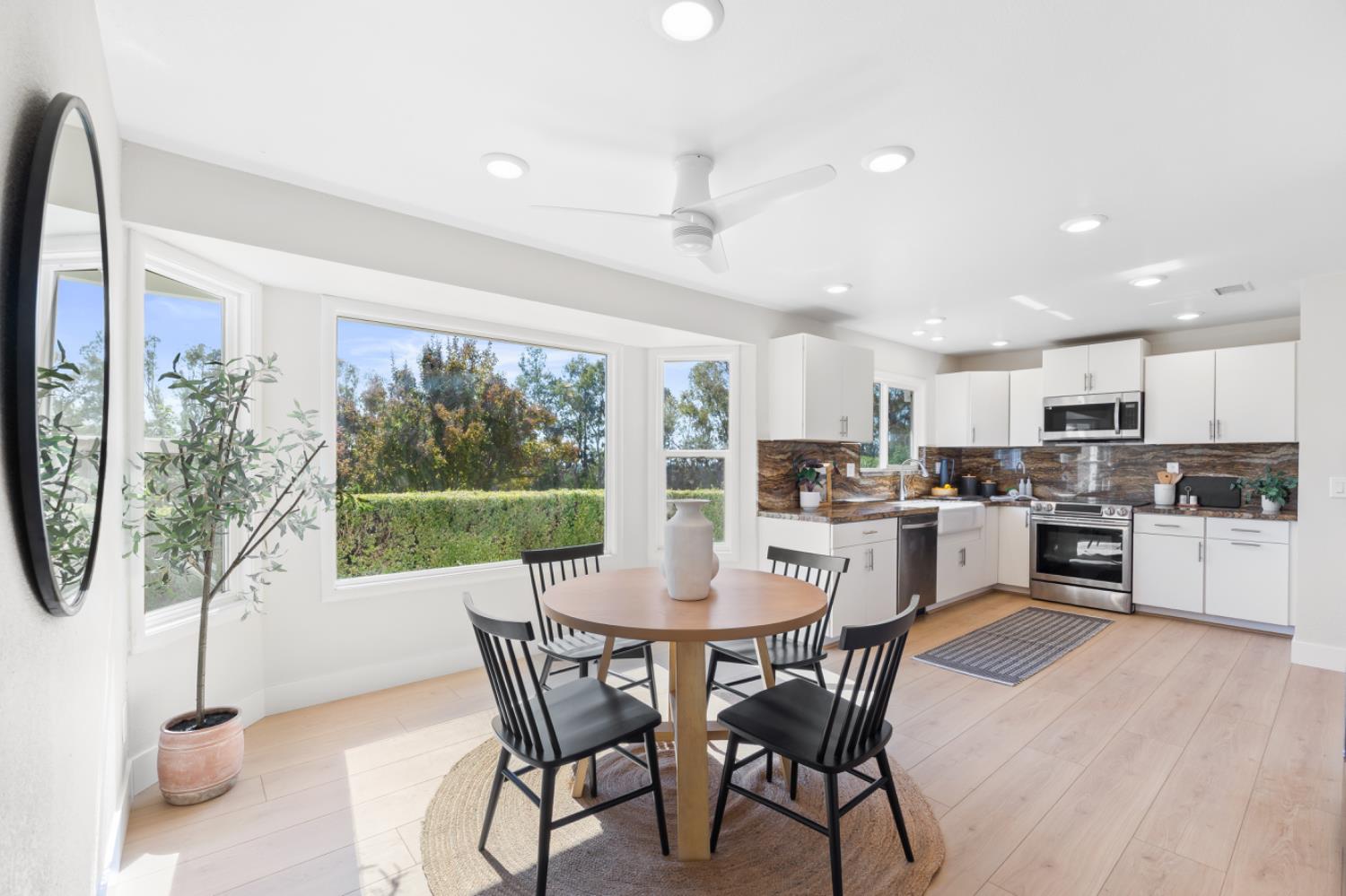 2495 Meadow Creek Road Lincoln, CA 95648 - Photo 33 of 94 a view of a dining room with furniture window and outside view
