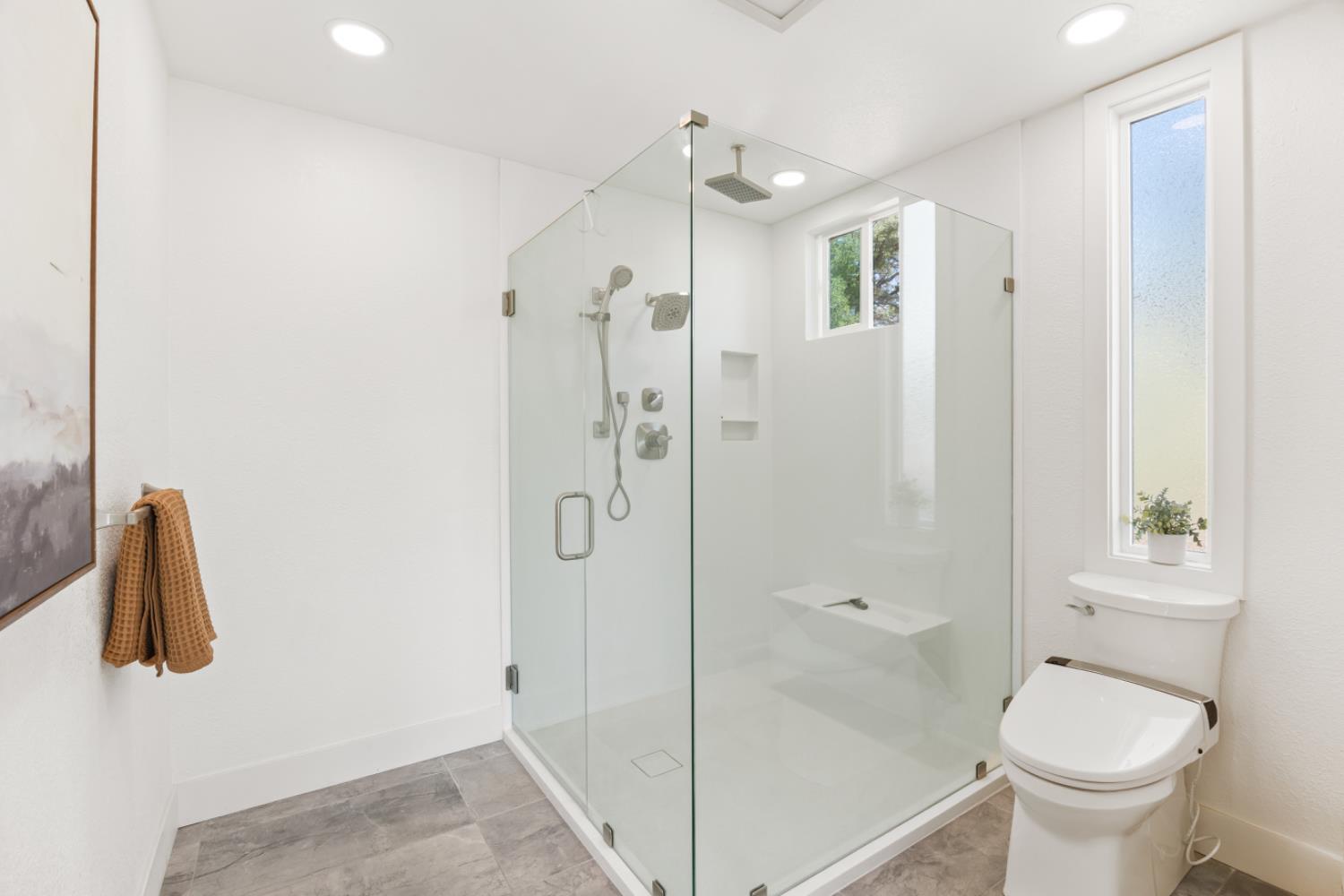 2495 Meadow Creek Road Lincoln, CA 95648 - Photo 58 of 94 a bathroom with a shower a toilet and sink